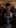 Multi-Shot Cinematic Scene: FBI Agent and Alien at a Party