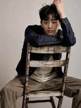 Create a restrained studio fashion portrait with an exact