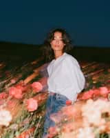 Create a cinematic fashion editorial portrait at blue hour