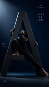 Create a 9:16 high-fashion editorial poster where one person