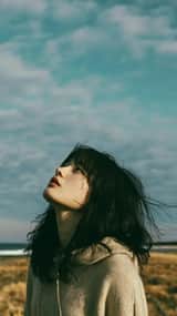 Cinematic minimalist portrait of a beautiful young East