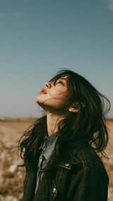 Cinematic minimalist portrait of a beautiful young East