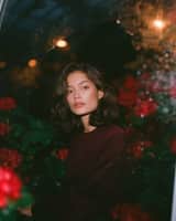 Dreamy cinematic nighttime portrait of a beautiful young