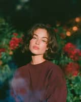 Dreamy cinematic nighttime portrait of a beautiful young