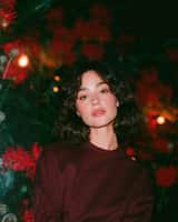 Dreamy cinematic nighttime portrait of a beautiful young