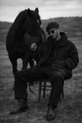 Monochrome Editorial Portrait: Man and Horse