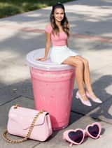 Photorealistic Miniature Woman on Milkshake Cup