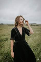 Serene Western Girl in Tall Grass Portrait