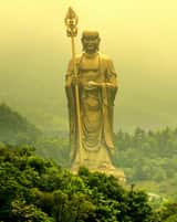 Technical schematic overlay on Ksitigarbha Bodhisattva statue