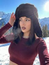 Winter Glam Selfie in Fur Hat on Snowy Mountain