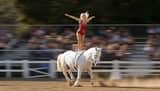 Woman Galloping on Horse
