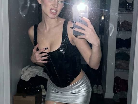Tense Mirror Selfie Before a Rave Prompt