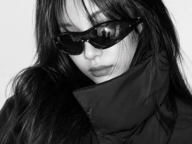 Create a close-up black and white high-fashion editorial