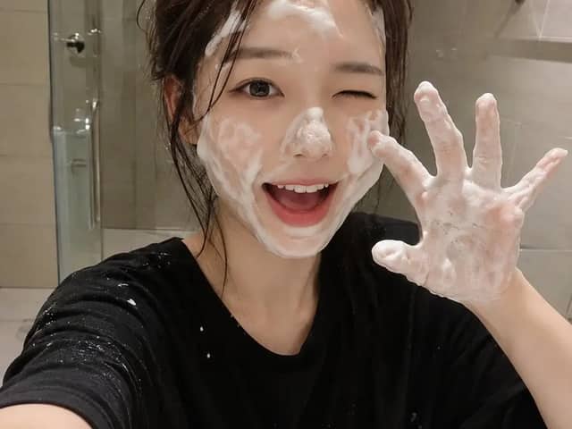 A RAW ultra-realistic smartphone photo of a cute young