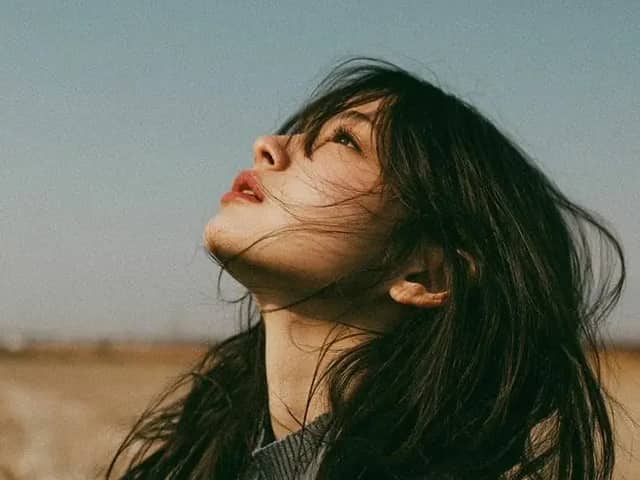Cinematic minimalist portrait of a beautiful young East