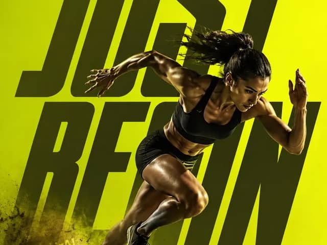 Full-body action shot of a female athlete explosively