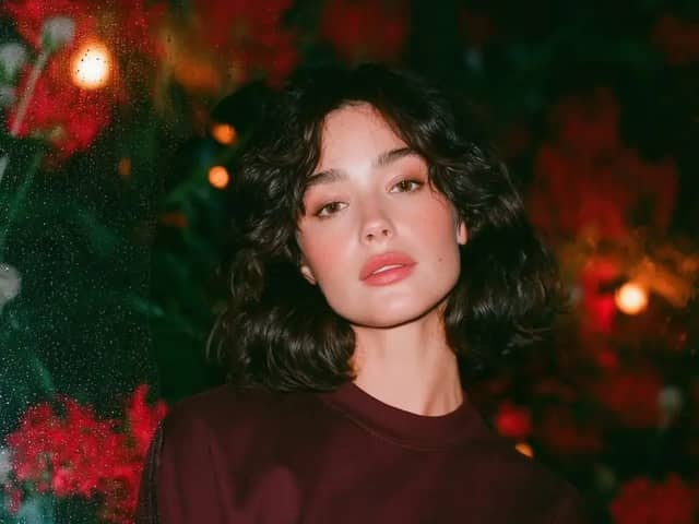 Dreamy cinematic nighttime portrait of a beautiful young