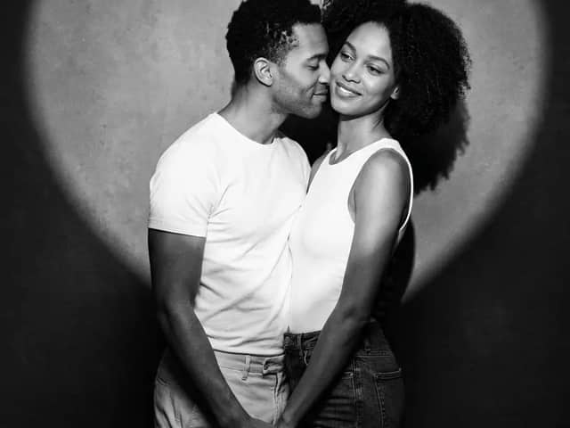 Create a romantic black and white studio portrait of a real