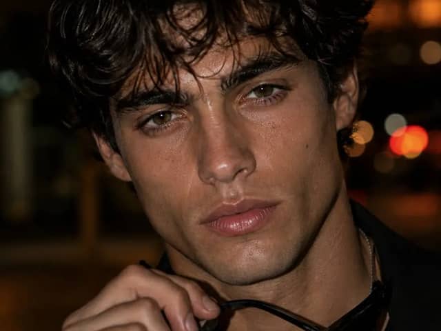 Photorealistic close-up editorial portrait of a young adult