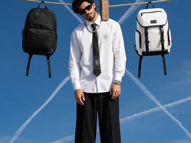A surreal high-fashion editorial photograph of a stylish
