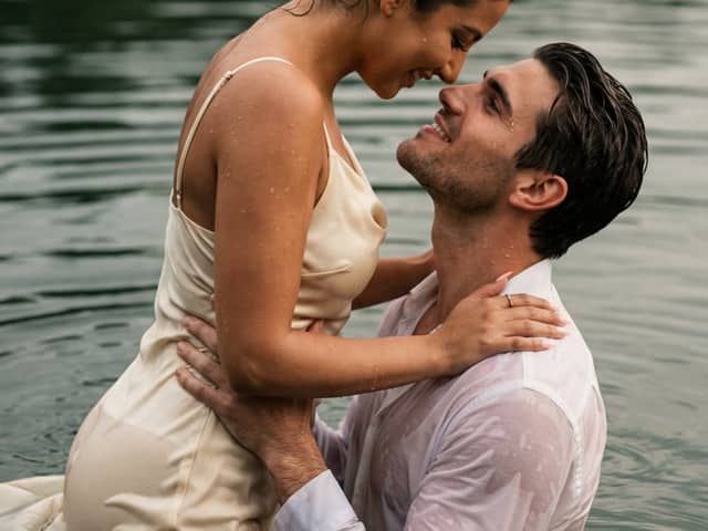 Cinematic Couple Embrace in Lake Water