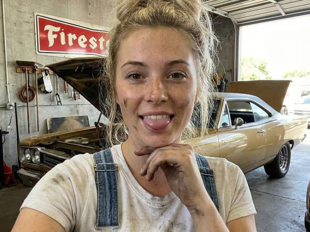 Mechanic Garage Selfie with iPhone 17 Pro Max Specs (JSON)