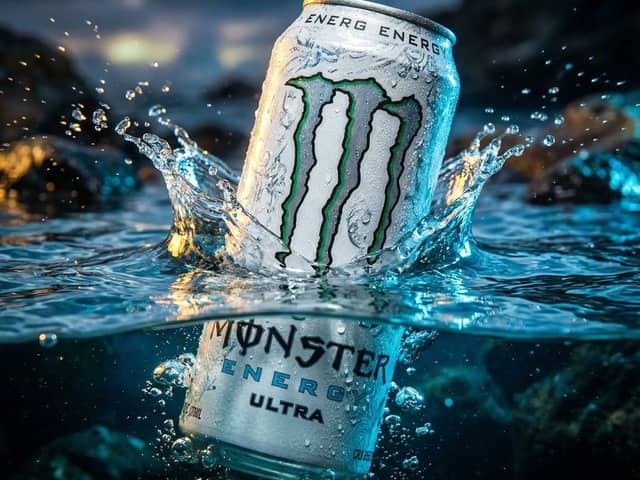 Product Ad: White Monster Energy Can Submerged in Water