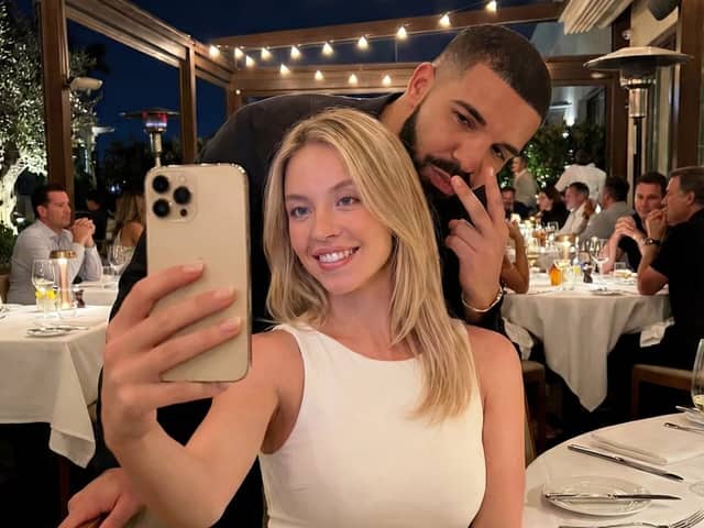 Selfie Scene in an Upscale Restaurant with Text Overlay