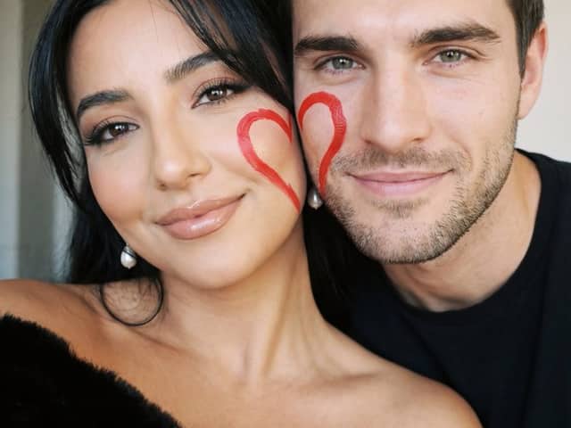 Ultra-Close Photorealistic Couple Selfie with Heart Cheek Paint