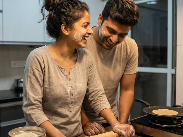 Ultra-realistic Indian Couple Cooking Portrait