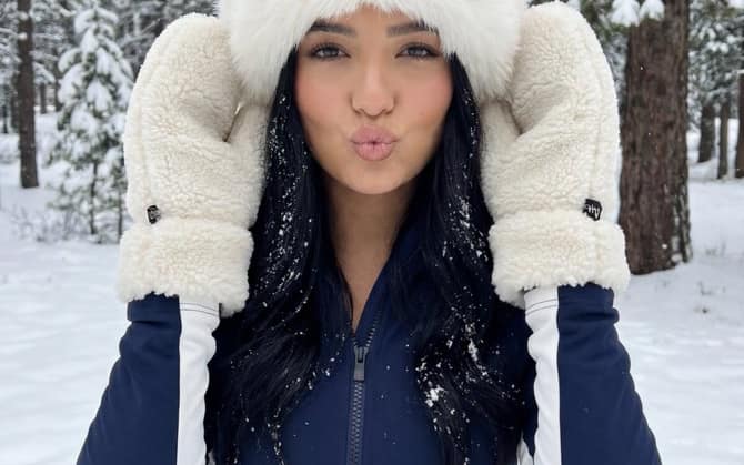Winter Sport Lifestyle Portrait with Fur Hat and Pout