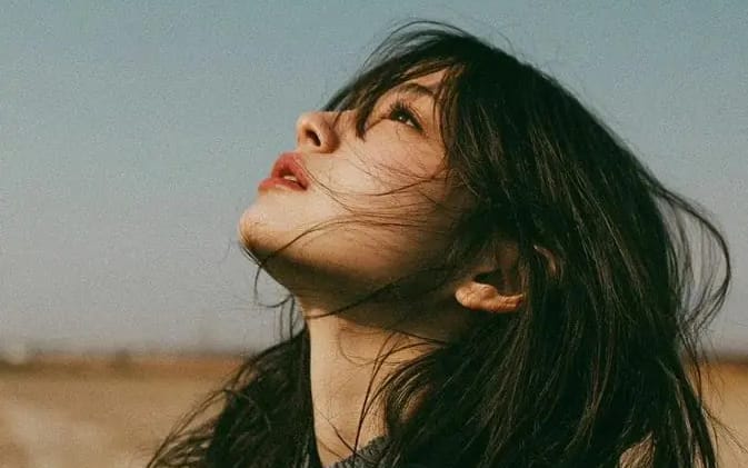 Cinematic minimalist portrait of a beautiful young East