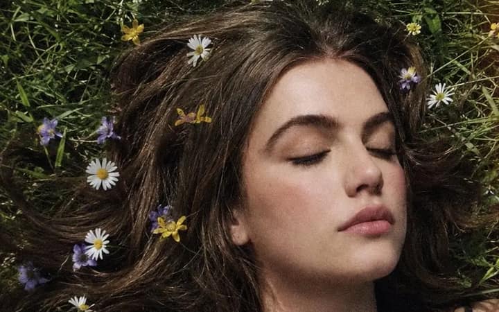 Do not change the facial features, proportions, hair color