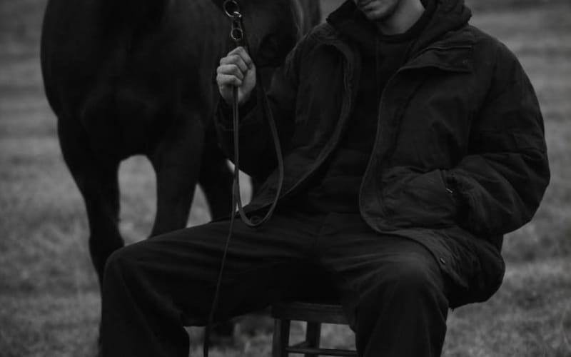 Monochrome Editorial Portrait: Man and Horse