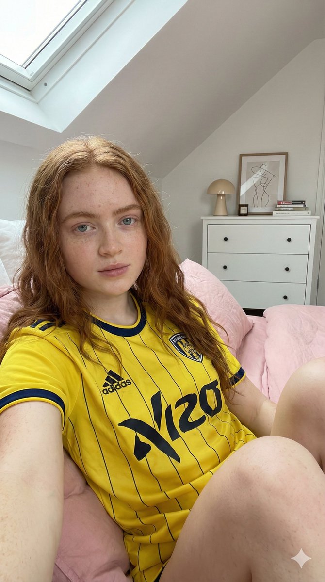 Photorealistic Selfie of Sadie Sink in a Soccer Jersey
